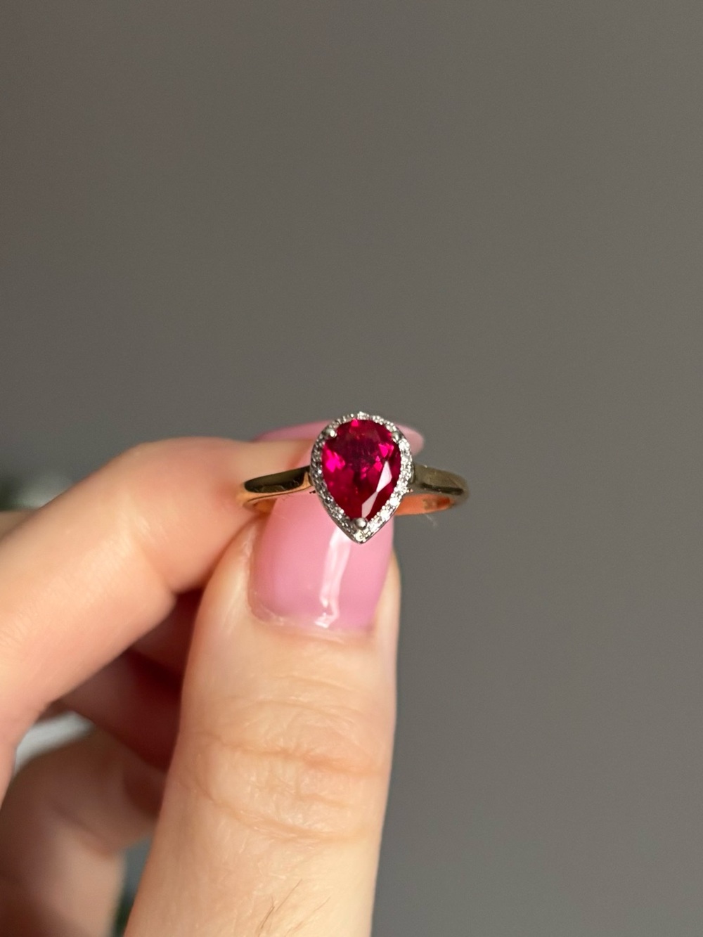 Elegant Pear-Cut Ruby Halo Ring - 10K Yellow Gold